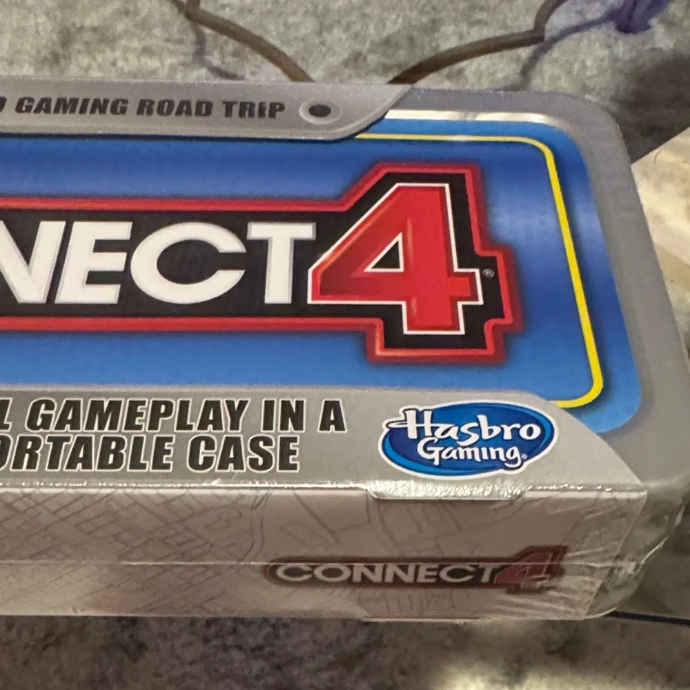 Hasbro Gaming Road Trip Connect 4 Portable Game Tin in Blue and Silver